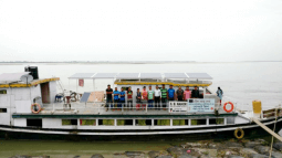Solar-powered boat clinic on river Bramhaputra