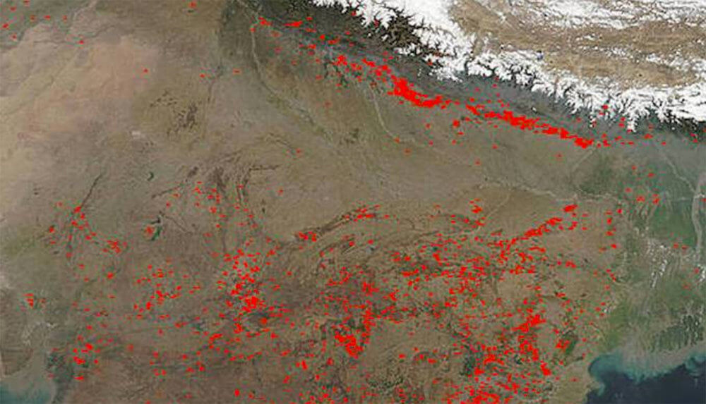 A satellite image of agricultural fires raging across India.
