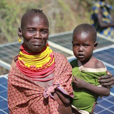 Mother, child and solar panel.jpg