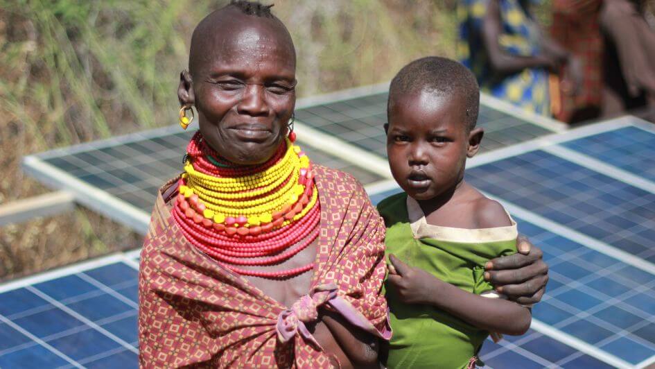 Mother, child and solar panel.jpg